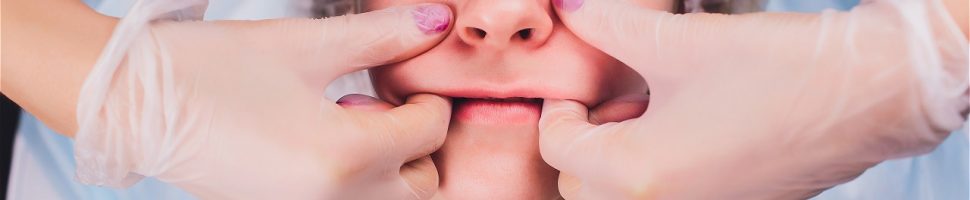 cosmetologist-makes-buccal-massage-patient-s-facial-muscles